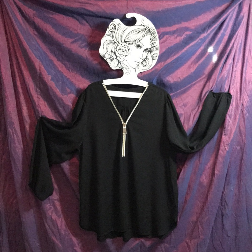 Black long sleeve blouse.